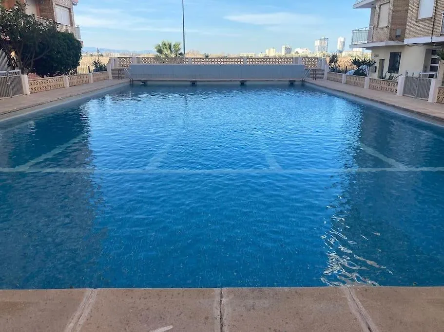 Coqueto Apartamento de Playa con Piscina y Terraza-1